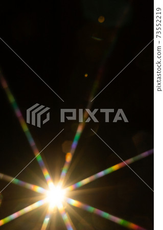 Abstract sun flare. The lens flare is subject to digital correction Abstract sun flare. The lens flare is subject to digital correction 73552219