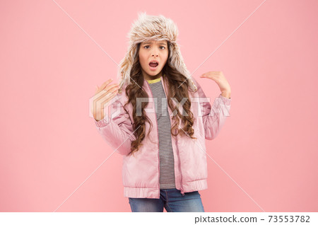 Narcissist fashionista. Child long hair soft fur hat enjoy  73553782