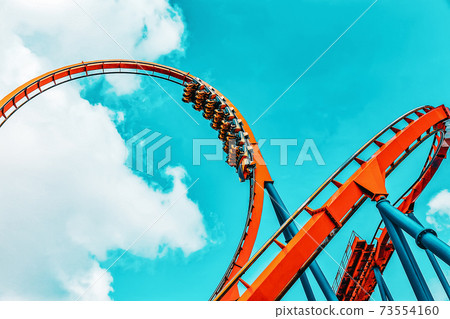 Roller Coaster in funny amusement  park 73554160