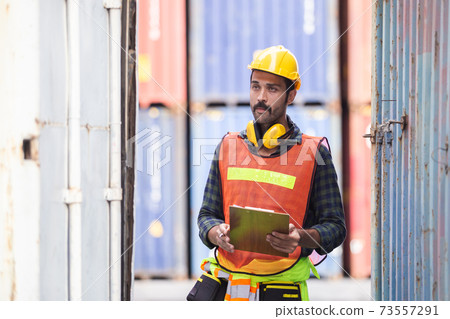 Foreman industrial logistic checking at container cargo. Foreman industrial logistic checking at container cargo. 73557291