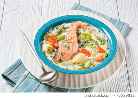 Lohikeitto, salmon fish soup with cream, top view Lohikeitto, salmon fish soup with cream, top view 73559038