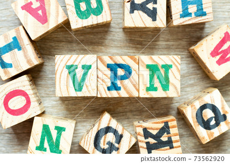 Alphabet letter block in word VPN (abbreviation of virtual private network) with another on wood background Alphabet letter block in word VPN (abbreviation of virtual private network) with another on wood background 73562920
