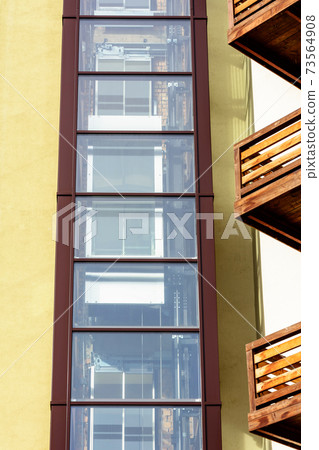 The appearance of the hotel is beautiful, extremely complex, perspective, balconies. 73564908