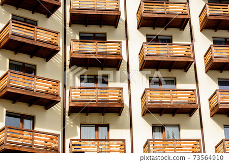 The appearance of the hotel is beautiful, extremely complex, perspective, balconies. 73564910