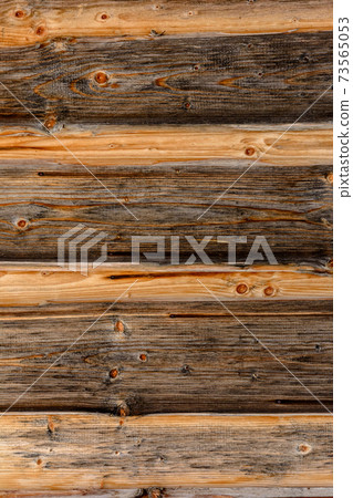 The structure of the wooden log wall, texture of wooden beams The structure of the wooden log wall, texture of wooden beams 73565053