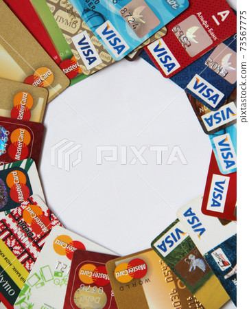 VISA and Mastercard credit cards situated on edge of picture with empty middle VISA and Mastercard credit cards situated on edge of picture with empty middle 73567775