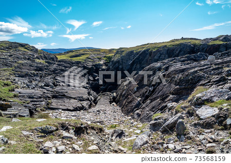 The coastline at Dawros in County Donegal - Ireland 73568159