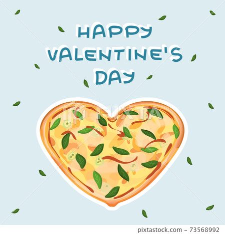 Yellow Heart shaped pizza with cheese. Blue Happy Valentines Day text, green leaves are around Yellow Heart shaped pizza with cheese. Blue Happy Valentines Day text, green leaves are around 73568992
