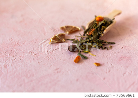 Pile of green leaves Sencha tea 73569661