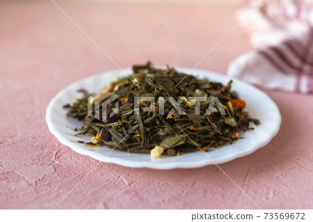 Pile of green leaves Sencha tea Pile of green leaves Sencha tea 73569672