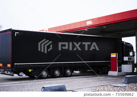 Cargo automobile for international transportation. Mock up freight vehicle of commercial trade Cargo automobile for international transportation. Mock up freight vehicle of commercial trade 73569862