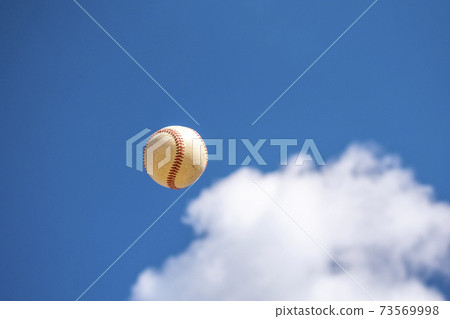 Ball flying in the winter sky [horizontal] 73569998