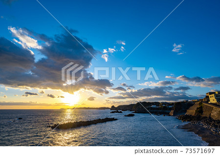 Sunset at the sea near the lighthouse in Daio-cho, Shima City 73571697
