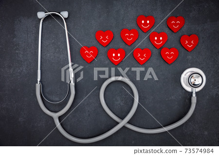 stethoscope and red hearts with emoticon faces stethoscope and red hearts with emoticon faces 73574984