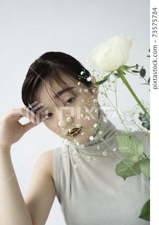 Flower and woman portrait Flower and woman portrait 73575784