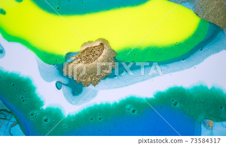 Neon colored marble pattern with golden glitter. Fluorescent liquid background. Artwork abstract bright texture. Neon colored marble pattern with golden glitter. Fluorescent liquid background. Artwork abstract bright texture. 73584317