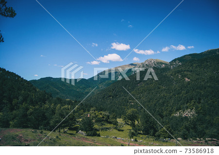 Landscape of the mountains, in Spain. A sunny summer day 73586918