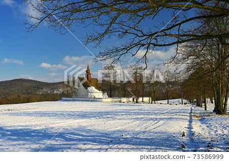 Winter landscape. Beautiful chapel near castle Veveri. Czech Republic city of Brno. The Chapel of the Mother of God. 73586999