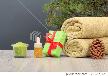 Spa composition with towel, aromatic oil, gift box, sea salt and soap Spa composition with towel, aromatic oil, gift box, sea salt and soap 73587164