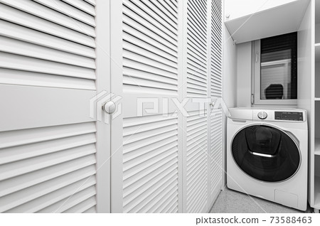 White utility room with big closet in new apartment 73588463