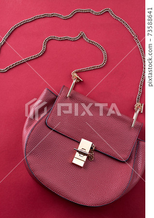 Red handbag vertical shot. 73588641