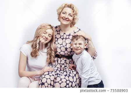happy smiling blond family together posing cheerful on white background, generation concept. lifestyle people happy smiling blond family together posing cheerful on white background, generation concept. lifestyle people 73588903