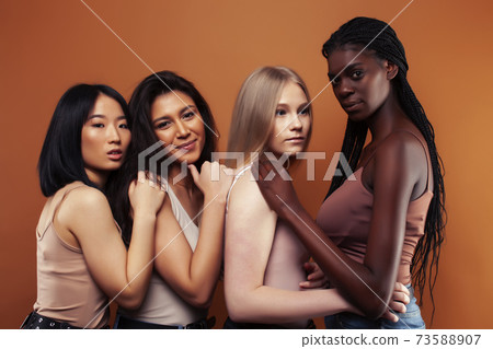 SaveDownload Previewyoung pretty asian, caucasian, afro woman posing cheerful together on brown background, lifestyle diverse nationality people concept SaveDownload Previewyoung pretty asian, caucasian, afro woman posing cheerful together on brown background, lifestyle diverse nationality people concept 73588907
