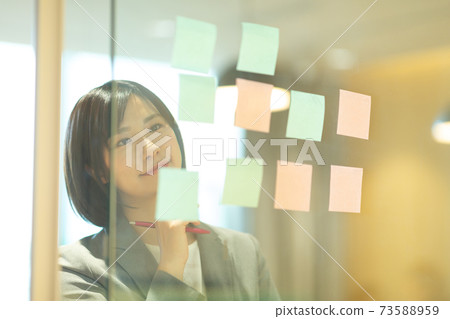 Woman working in the office 73588959