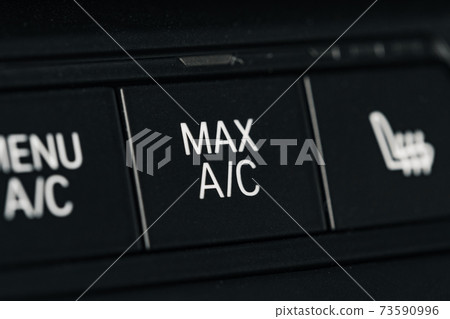 Buttons panel of the car on the dashboard Buttons panel of the car on the dashboard 73590996