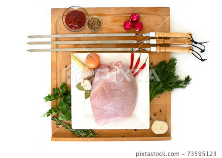 raw turkey meat, fillet for roasting on skewers. Barbecue preparation. ingredients 73595123