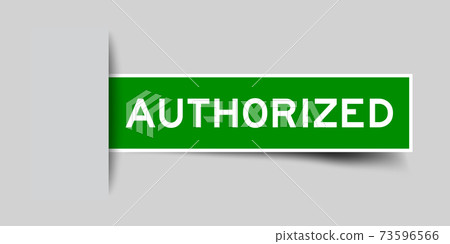 Inserted green color label sticker with word authorized on gray background 73596566