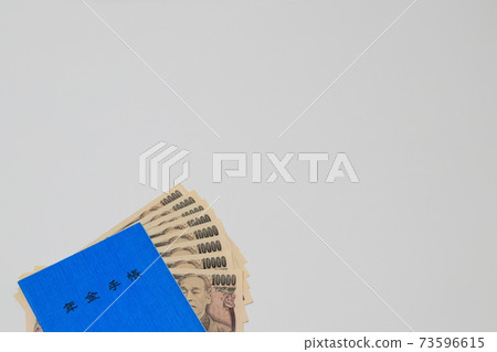 Pension handbook and 10,000 yen bill 73596615