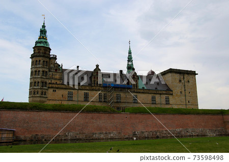 Kronborg Castle, a famous castle of world cultural heritage, built on the outskirts of Copenhagen, Denmark, has a stately appearance Kronborg Castle, a famous castle of world cultural heritage, built on the outskirts of Copenhagen, Denmark, has a stately appearance 73598498