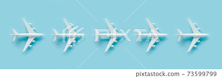White model plane, airplane on blue background. Top view, flat lay. White model plane, airplane on blue background. Top view, flat lay. 73599799