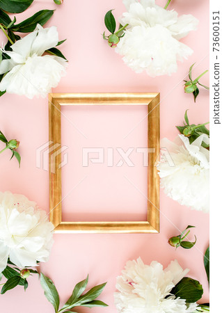 Frame of white peony flowers with space for text on pink background. Peony texture. Flat lay, top view.  73600151
