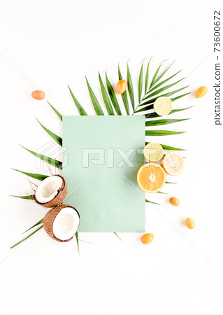 Creative layout made of paper and summer tropical fruits on white background. Food concept. flat lay, top view 73600672