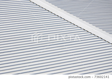 Metal gray roof with rhythmic parallel relief directions 73602141