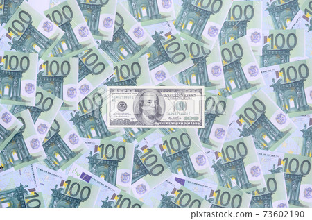 100 dollars bill is lies on a set of green monetary denominations of 100 euros. A lot of money forms an infinite heap 100 dollars bill is lies on a set of green monetary denominations of 100 euros. A lot of money forms an infinite heap 73602190