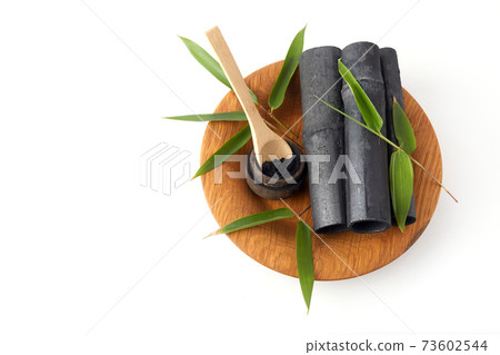 Natural Bamboo ativated charcoal and powder isolated on white background 73602544