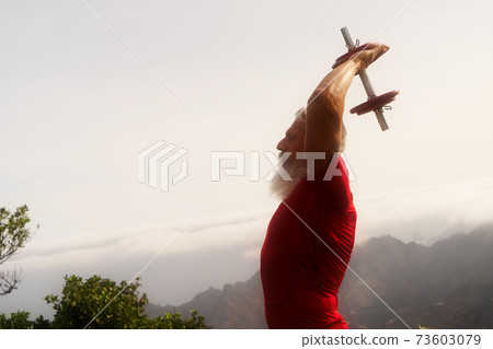 Senior man doing sport exercises Senior man doing sport exercises 73603079