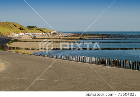 Westkapelle, The Netherlands, August 2019. The beaches of this location are wide and clean Westkapelle, The Netherlands, August 2019. The beaches of this location are wide and clean 73604823
