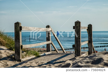 Westkapelle, The Netherlands, August 2019. The beaches of this location are wide and clean Westkapelle, The Netherlands, August 2019. The beaches of this location are wide and clean 73604824