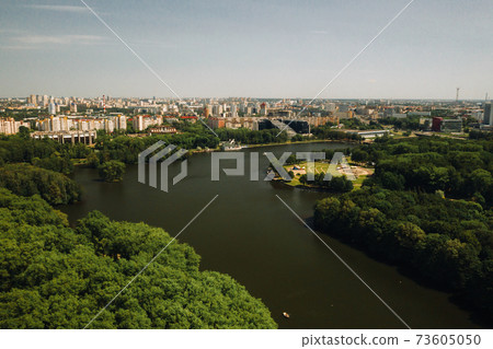 Top view of the victory Park in Minsk and the Svisloch river.A bird's-eye view of the city of Minsk and the Park complex.Belarus Top view of the victory Park in Minsk and the Svisloch river.A bird's-eye view of the city of Minsk and the Park complex.Belarus 73605050
