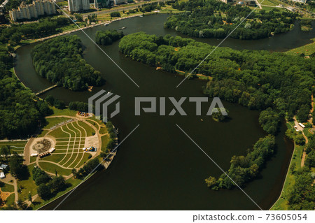 Top view of the victory Park in Minsk and the Svisloch river.A bird's-eye view of the city of Minsk and the Park complex.Belarus Top view of the victory Park in Minsk and the Svisloch river.A bird's-eye view of the city of Minsk and the Park complex.Belarus 73605054