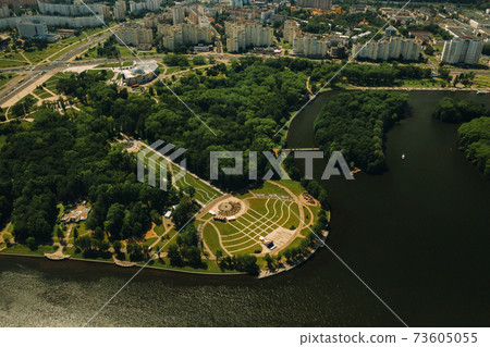 Top view of the victory Park in Minsk and the Svisloch river.A bird's-eye view of the city of Minsk and the Park complex.Belarus Top view of the victory Park in Minsk and the Svisloch river.A bird's-eye view of the city of Minsk and the Park complex.Belarus 73605055