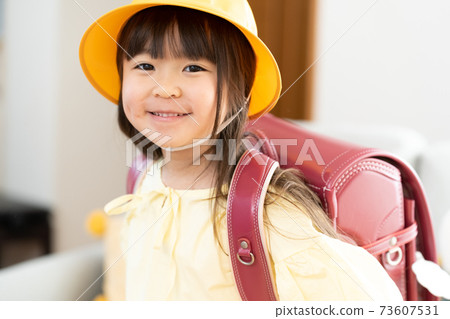 Elementary school students preparing to go to school 73607531