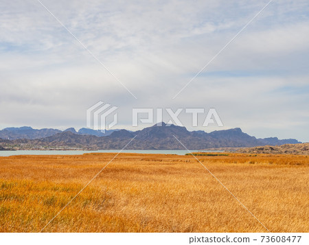 Clouds over some rural area of Colorado river 73608477