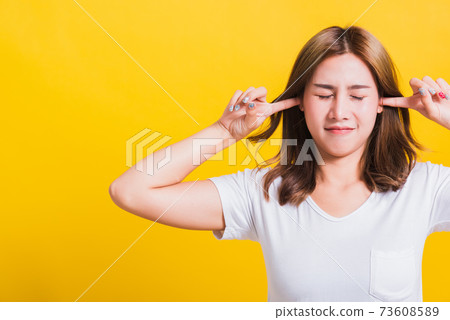 woman smile have closed palms ears with palms woman smile have closed palms ears with palms 73608589