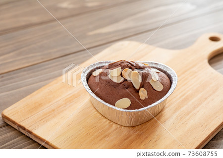 Making sweets at home Heart-shaped chocolate muffins for Valentine's Day Making sweets at home Heart-shaped chocolate muffins for Valentine's Day 73608755