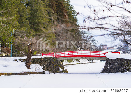 Uesugi Shrine in winter Ryomonbashi and moat (moat) Yonezawa City, Yamagata Prefecture 73608927